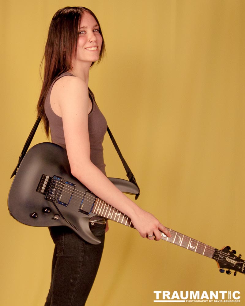 I saw an amazing picture on a web site of this female guitarist.  She was beautiful.  After a bit of searching, I was able to contact her and we did this shoot together.